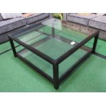 Glass top low table with black painted wood frame & glass shelf below, 97cms x 97cms x 41cms.