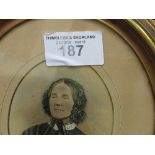 Pair of oval framed & glazed enhanced photographs of Victorian ladies. Price guide £30-40.