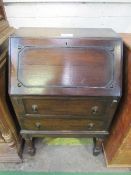 Small oak bureau with 2 drawers on stand with stretcher to base, 63cms x 40cms x 100cms. Price guide