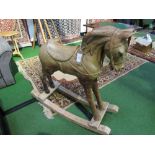 Pine carved horse on rockers (a/f). Price guide £50-60.