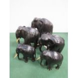 A 'family' of 5 ebony elephants. Price guide £30-40.