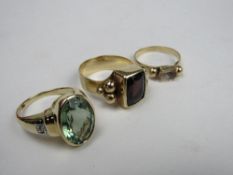 9ct gold ring set with brown stone, size Y, weight 10.9gms, a 9ct gold ring set with very large lime