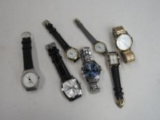7 quartz wristwatches, men's & ladies', all going. Price guide £15-20.