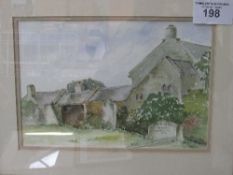 Framed & glazed watercolour of Devon Farmhouse, signed Joyce Taylor. Price guide £20-30.