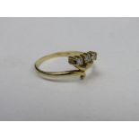 18ct gold ring with 3 diamonds in off-set setting, weight 1.8gms, size M 1/2. Price guide £30-50.