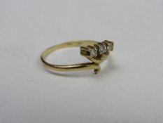 18ct gold ring with 3 diamonds in off-set setting, weight 1.8gms, size M 1/2. Price guide £30-50.