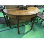 Mahogany demi-lune table on 4 block legs, 114cms x 56cms x 74cms. Price guide 5-10.