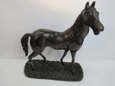 Large bronze cold cast race horse stallion figurine on base. Price guide £90-120.