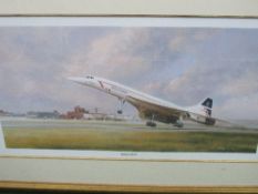 Gilt framed & glazed print of Concorde. Price guide £5-10.