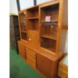 Teak display unit of 2 glazed doors & 2 open shelves over sideboard of 2 cupboards flanking 5