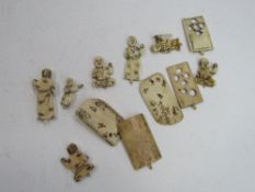 A collection of oriental carved bone objects, possibly children's toys. Price guide £20-30.