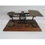 A set of Sampson Mordan postal scales & weights. Price guide £60-70.