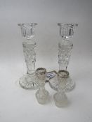 Pair of glass candlestick with a pair of silver rimmed bud vases