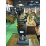 Carved wood Oriental figurine. Price guide £5-10.