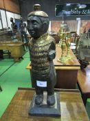 Carved wood Oriental figurine. Price guide £5-10.