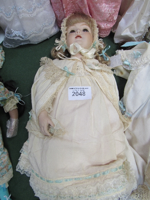 Large porcelain doll. Price guide £15-25.