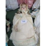 Large porcelain doll. Price guide £15-25.