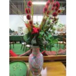 Large pink floral pattern vase & artificial flowers, 47cms high. Price guide £20-30.