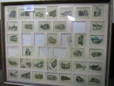 Framed & glazed collection of Wills cigarette cards, depicting public houses. Price guide £5-10.