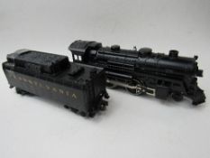 'O' gauge locomotive 'Lionel' c/w tender. Price guide £30-40.