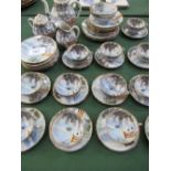 Part Japanese porcelain tea set. Price guide £10-15.