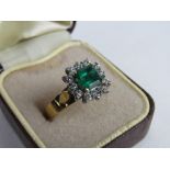 18ct gold ring with square green stone surrounded with diamonds, size Q 1/2, wt 5.7gms. Price
