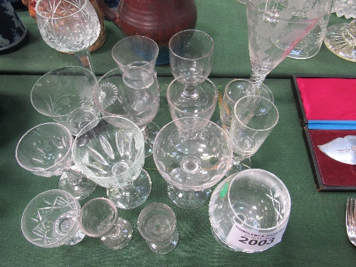 Qty of drinking glasses, some etched & including an etched tall goblet. Price guide £5-10.