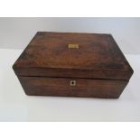 Small mahogany writing slope with leather interior, working lock & key. Price guide 20-30.