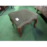 Victorian upholstered mahogany framed foot stool. Price guide £20-30.