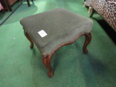 Victorian upholstered mahogany framed foot stool. Price guide £20-30.