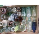 Box of small Victorian bottles & 10 bottles stoppers. Price guide £10-15.
