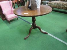 Mahogany low tilt-top pedestal table to pad feet, 76cms diameter x 64cms high. Price guide £20-30.