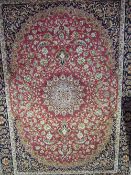 Red ground Keshan rug, 1.9 x 1.4. Price guide £50-60.