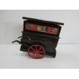 A music box in the form of a street barrel organ by Tallert of London. Price guide £20-25