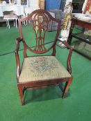 Mahogany drop-in seat shield back carver chair. Price guide £20-30.