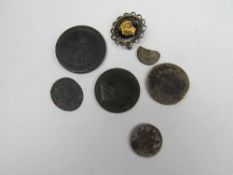 A collection of 7 coins including 2 Roman & a Colombian silver coin, enamelled farthing 1952 in