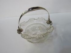 Fine cut glass jam pot with Dutch silver handle. Price guide £20-30.