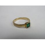 18ct gold ring with square green stone, weight 2.6gms, size O. Price guide £50-70.