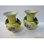 Pair of 19th century Berlin vases with goat head handles, decorated with scenes of lovers (1 goats