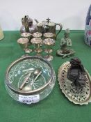 A brass Buddha figurine, an ebony dragon dish, a qty of silver plate & a glass bowl with silver