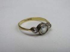 18ct gold & platinum ring with large central white stone & flanked by 2 diamonds, weight 3gms,