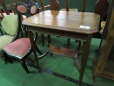 Oak display table on tapered legs, 66cms x 46cms x 73cms. Price guide £10-20.