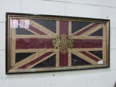 Framed Union Jack c/w Royal Coat of Arms, 59cms x 119cms. Price guide £20-30.