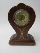 30 hour balloon shape wooden inlaid desk/mantle clock. Price guide £25-30.