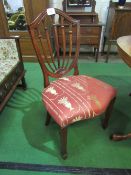 4 shield-back upholstered seat dining chairs. Price guide £20-40.