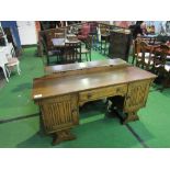 Oak 1930's style dressing table, 146cms x 45cms x 133cms. Price guide £10-20.