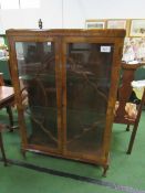 Mahogany veneer display cabinet with decorative work to doors & 2 glass shelves, 88cmx x 26cms x