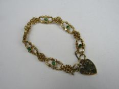 18ct gold bracelet set with green stones & diamonds, weight 26.5gms. Price guide £450-500.