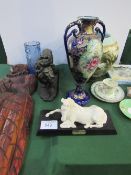 A lion figurine, a horse figurine, a carved wall mounted figurine of a woman & assorted china &