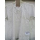 Victorian linen child's over-dress, in excellent condition. Price guide £10-20.